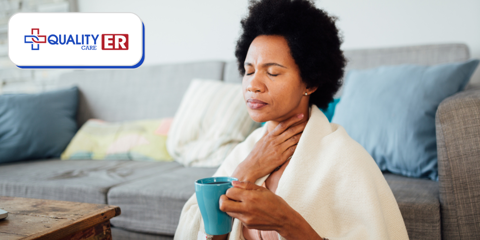 woman suffering from sore throat holding a cup of tea at home strep sick