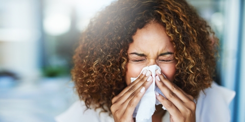 person suffering from allergies