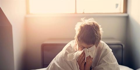 Child sneezing due to respiratory illness.Respiratory Illnesses in Children: When to Seek Emergency Care For Your Child