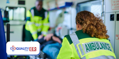 EMTs taking a patience into an ambulance