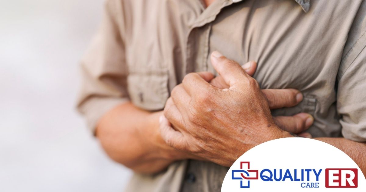 man holding his chest